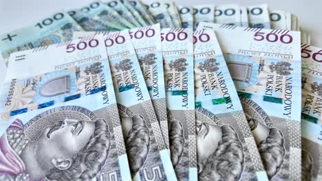 Polish-money-counted-on-the-table,-highest-denomination-of-PLN-500