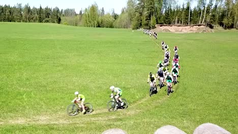 Cyclists-fighting-hard-in-a-turn-in-the-off-road-section-of-this-race