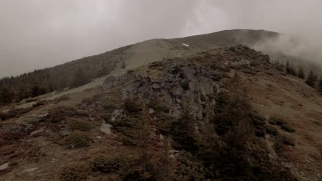 Aerial-4k-view-of-a-rock-in-morning-in-the-top-of-Parang-mountain-flying-in-circle