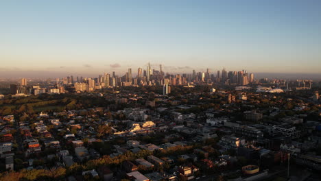 Aerial-View,-Melbourne-Australia-Cityscape-Skyline-at-Sunrise,-Establishing-Drone-Shot