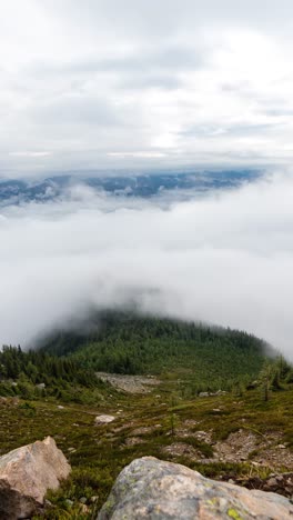 Vertical-4k-Timelapse,-Clouds-Inversions-Above-Mountain-Landscape,-Mount-St