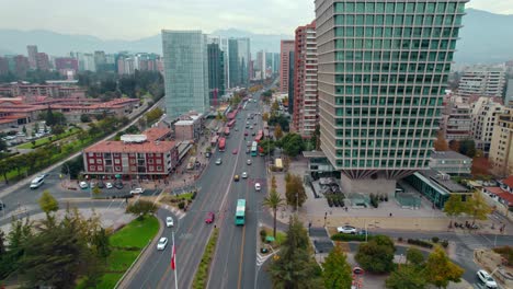 Aerial-Drone-Fast-tracks-traffic-at-Santiago-de-chile-vibrant-capital-SCL-building-Apoquindo-avenue-at-Escuela-Militar-neighborhood