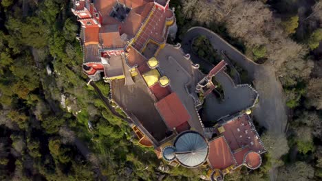 Top-Down-View-of-Colorful-Pena-Palace-in-Sintra,-Portugal:-Birds-Eye-View,-Looking-Down-From-Above-at-Bright-Castle-Near-Lisbon,-Bright-Sunny-Day