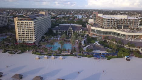 Drone-shot-of-JW-marriot-resort-in-Marco-Island,-Florida-with-pools