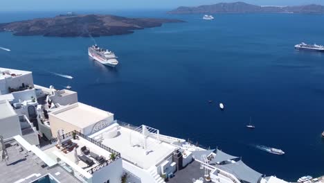 Aerial-Panoramic-Shot-of-Caldera-Santorini-Cruise-ship-in-front-of-Volcano,-Greece