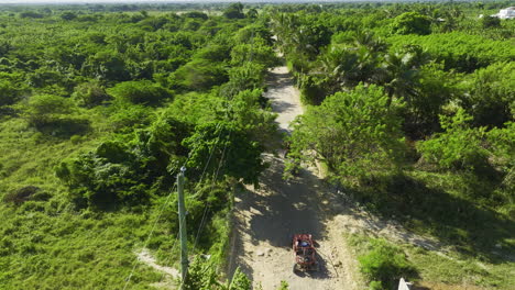 Aerial-View-Of-Driving-Off-road-Buggies-In-Macao,-Punta-Cana,-Dominican-Republic
