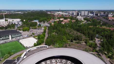 Aerial-Pullback-Reveals-Renovated-Helsinki-Olympic-Stadium-on-Typical-Day