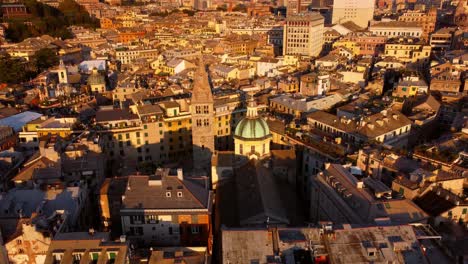 Golden-hour-aerial-view-of-Genoa's-historic-center-with-warm-sunlight