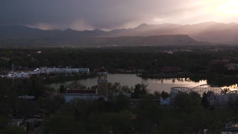 Aerial-footage-of-Lakewood-and-the-mountains-during-sunset