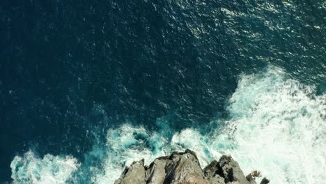 Ocean-water-churns-in-El-Boiler-San-Benedicto-Revillagigedo-Islands-Mexico,-aerial-top-down