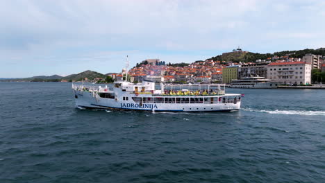 Jadrolinija-Ferry-Cruising-Over-Adriatic-Sea-Leaving-Port-Of-Sibenik,-Croatia