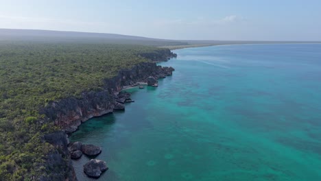 Drone-flight-over-the-rocky-coastline-in-the-Dominican-Republic-on-a-sunny-day