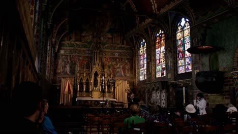 Belgian-People-Inside-The-Basilica-of-the-Holy-Blood-In-Bruges,-Belgium