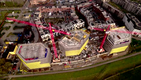 Top-down-aerial-of-real-estate-project-new-housing-construction-site-part-of-urban-development-Noorderhaven-neighbourhood