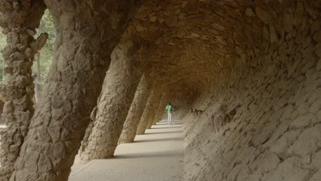 Architectural-rock-designed-pathway-in-the-Güell-Park,-tourist-attraction-Barcelona
