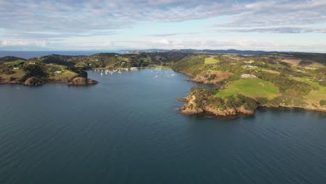 Matiatia-Bay-In-Late-Afternoon,-Auckland,-New-Zealand---Aerial-Drone-Shot