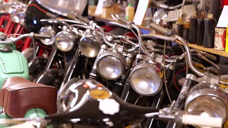 Headlights-Of-Antique-Motorcycles-At-Motor-Muzeum-In-Soltvadkert,-Hungary