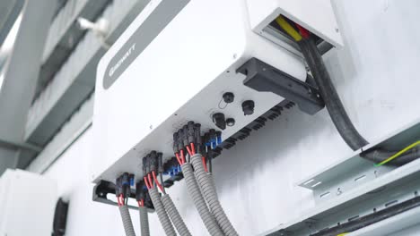 Bottom-view-of-wires-connected-to-solar-inverter-of-Industry-in-Pakistan