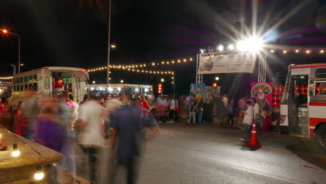 Timelapse-of-the-lion-and-dragon-dance-performers-lining-up-and-going-on-the-truck-after-a-performance,-Changchoengsao,-Thailand,-in-a-Chinese-New-Year-celebration