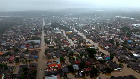 Rio-Grande-Do-Sul,-flood-emergency,-buildings-under-water,-urban-boat-travel