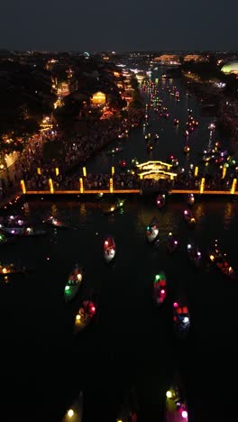 Hoi-An-Lantern-Festival,-Vietnam---Night-View-of-Boats-with-Lanterns,vertical