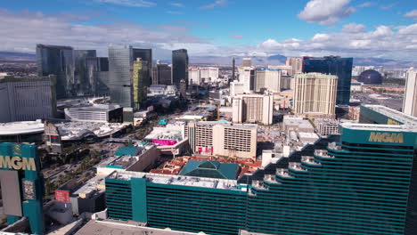 Las-Vegas-USA,-Aerial-View-of-Strip-Buildings,-Hotel-Casinos-and-Shopping-Malls-on-Sunny-Day