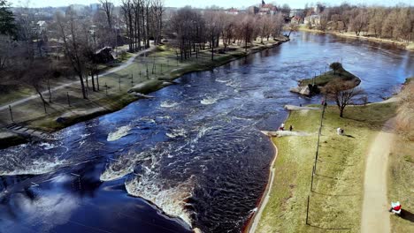 Gauja-River-Rapids-Flowing-Through-The-Park-In-Valmiera,-Latvia