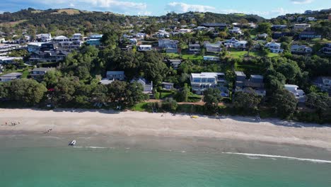 Aerial-View-Of-Big-Oneroa-Beach-In-Auckland,-New-Zealand-At-Daytime---Drone-Shot