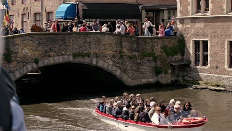 People-In-Boats-Sailing-On-Canal-In-Bruges,-Belgium