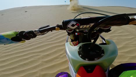 High-speed-motorcycle-riding-along-sand-dunes