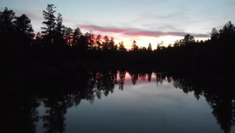 Flying-over-a-mirror-like-lake-in-northern-Arizona-at-white-horse-lake