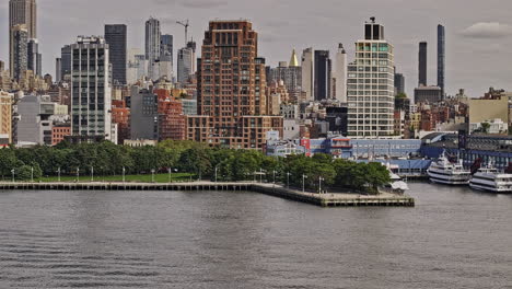 NYC-New-York-Aerial-v454-zoomed-flyover-Hudson-river-capturing-waterfront-park-and-Chelsea-Piers-sports-complex-against-cityscape-of-Midtown-Manhattan---Shot-with-Mavic-3-Pro-Cine---September-2023