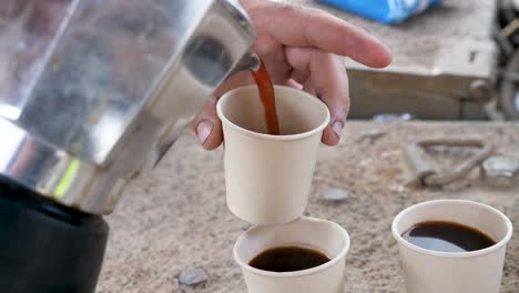 Military-serving-hot-coffee-during-a-break,-Israel–Hamas-war