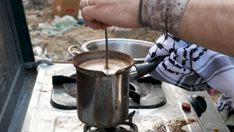 Military-preparing-coffee-during-break,-Israel–Hamas-war-conflict