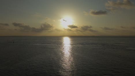 Sunset-on-Ocean-Horizon-of-Zanzibar-Island,-Tanzania,-Aerial-with-Copy-Space