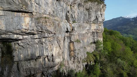 Flying-Close-To-Distinctive-Rocks-Formation-In-Seerenbach-Falls-Amden,-St
