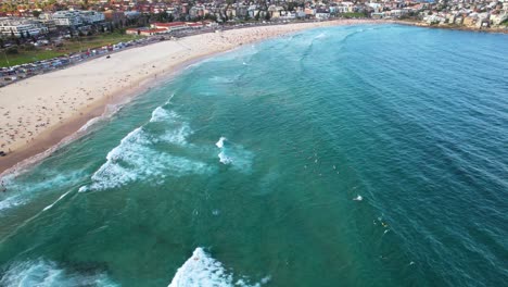 A-stationary-4k-drone-shot-of-the-famous-Bondi-Beach-in-Sydney,-New-South-Wales