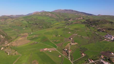 High-Aerial-Drone-Shot-Above-European-Farmland-in-Summer