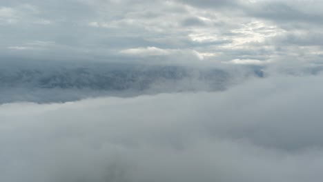 Timelapse,-Clouds-on-High-Elevation,-Moving-Above-Valley-and-Mountain-Peaks