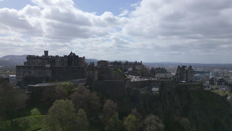 Drone-low-angle-view-of-the-Edinburgh-Castle-on-the-castlehill-in-Scotland