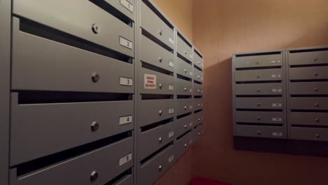 Metal-stacks-of-letterbox-and-mailbox-in-retro-soviet-apartment