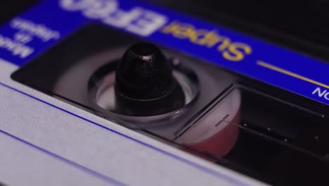 Inserting-and-Start-Playing-Audio-Cassette-Tape-Recording,-Macro-Close-Up