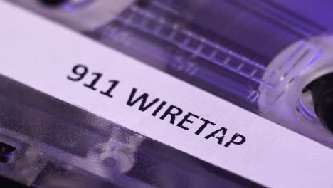 911-Wiretap-Recording-on-Audio-Cassette-Tape-Playing,-Macro-Close-Up-Detail