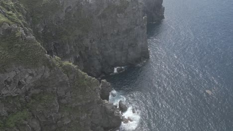 Aerial-top-down-view-of-Ponta-do-Cintrao-rocky-cliffs-of-Sao-Miguel-Island,-Azores,-Portugal
