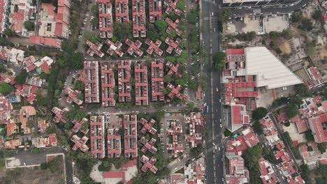 Aerial-view-of-a-housing-complex-in-Coyoacan,-showcasing-geometric-shapes-buildings