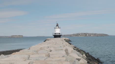 Spring-point-ledge-light-house-at-the-end-of-a-rock-pier-on-the-Atlantic-Ocean