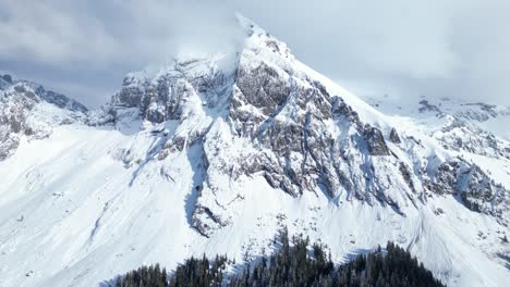Cinematic-Shot-Of-Fronalpstock-Glarus-Snowy-Mountains,-Switzerland