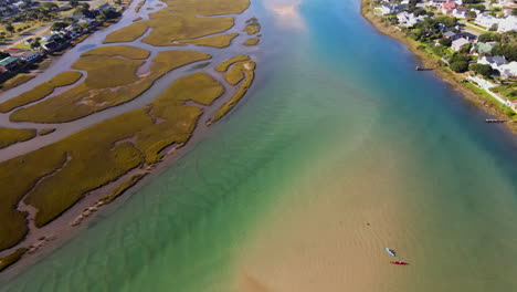 Aerial-tilt-up-view-over-idyllic-Goukou-river-estuary-with-clear-water,-Stilbaai