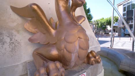 Slow-establishing-shot-of-the-Golden-Angel-fountain-in-Carpentras