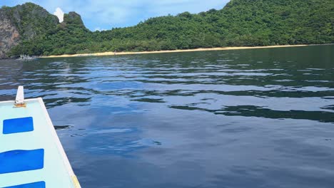 Sailing-in-Tropical-Paradise-of-El-Nido,-Palawan-Island,-Philippines,-Beach-and-Lush-View-From-Boat
